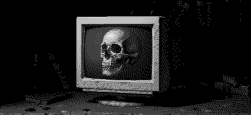 A desktop monitor with a skull on it